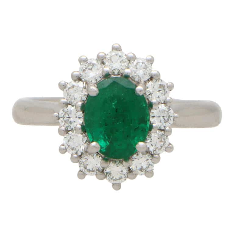 Contemporary Oval Emerald and Diamond Cluster Ring