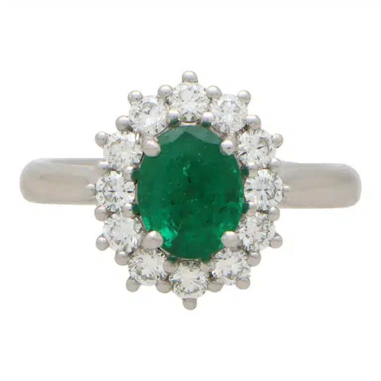 Contemporary Oval Emerald and Diamond Cluster Ring