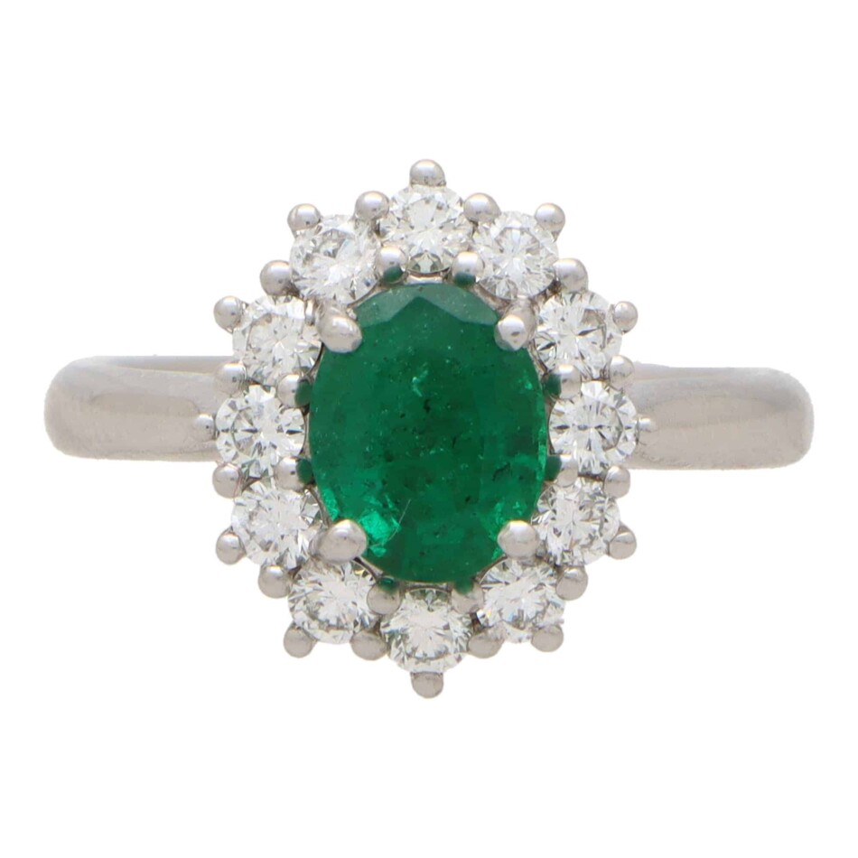 Contemporary Oval Emerald and Diamond Cluster Ring