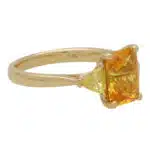 Elongated Orange Sapphire and Yellow Diamond Three Stone