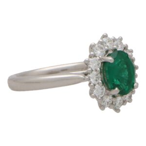 Contemporary Oval Emerald and Diamond Cluster Ring