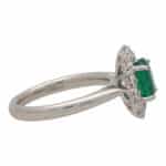 Contemporary Oval Emerald and Diamond Cluster Ring