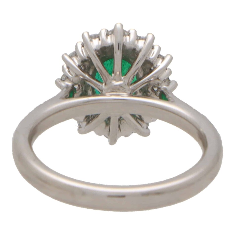 Contemporary Oval Emerald and Diamond Cluster Ring