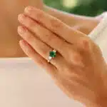 Contemporary Oval Emerald and Cushion Cut Diamond Ring