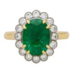 Contemporary Oval Emerald and Diamond Cluster Ring