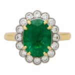 Contemporary Oval Emerald and Diamond Cluster Ring