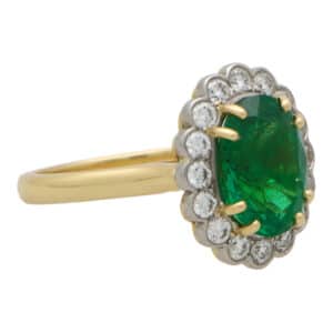 Contemporary Oval Emerald and Diamond Cluster Ring