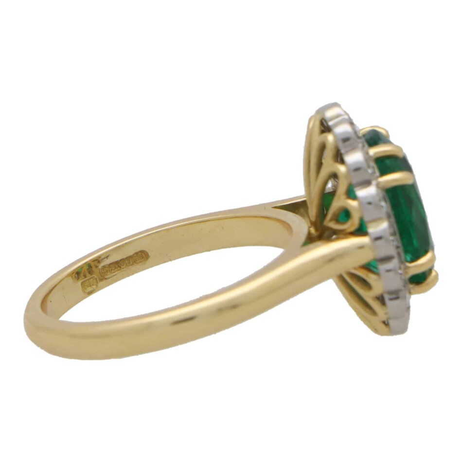 Contemporary Oval Emerald and Diamond Cluster Ring