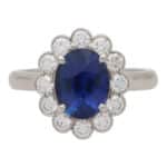 Contemporary Oval Sapphire and Diamond Cluster Ring