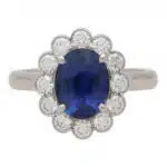 Contemporary Oval Sapphire and Diamond Cluster Ring