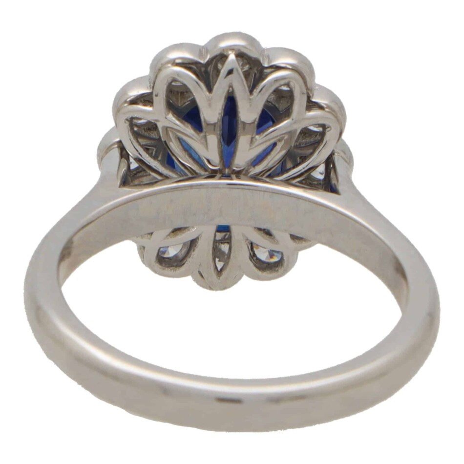 Contemporary Oval Sapphire and Diamond Cluster Ring