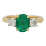 Contemporary Oval Emerald and Cushion Cut Diamond Ring