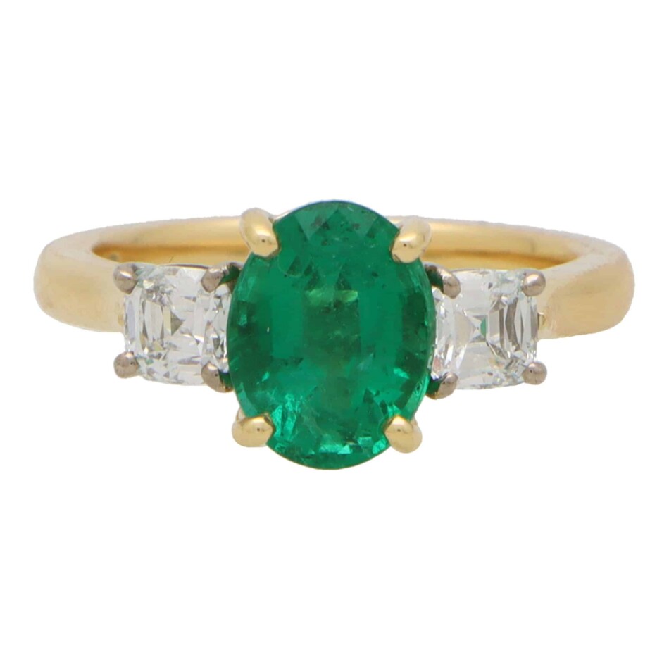 Contemporary Oval Emerald and Cushion Cut Diamond Ring