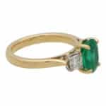 Contemporary Oval Emerald and Cushion Cut Diamond Ring