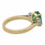Contemporary Oval Emerald and Cushion Cut Diamond Ring