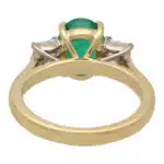Contemporary Oval Emerald and Cushion Cut Diamond Ring