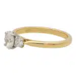 Contemporary GIA Certified Oval Diamond Three Stone Ring