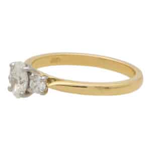 Contemporary GIA Certified Oval Diamond Three Stone Ring