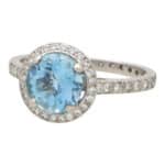 Contemporary Aquamarine and Diamond Halo Ring