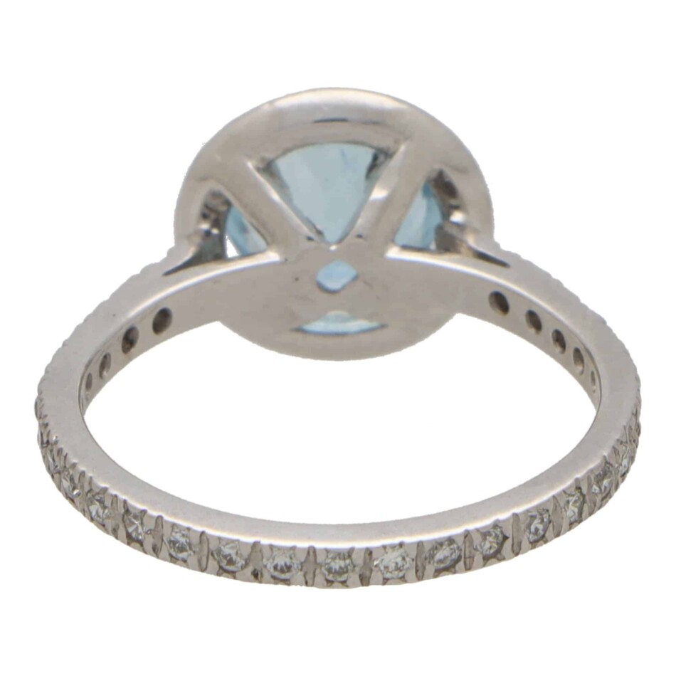 Contemporary Aquamarine and Diamond Halo Ring