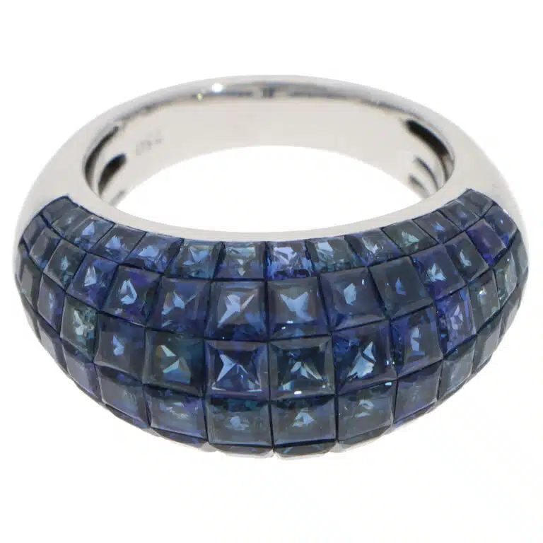 Contemporary Sapphire Invisible Set Bombe Ring in White Gold