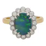 Contemporary Black Opal and Diamond Cluster Ring