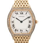 Vintage Cartier Tortue 26mm yellow gold watch