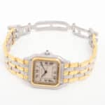 A vintage Cartier Panthere three-row gold and steel watch