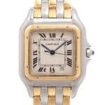 A vintage Cartier Panthere three-row gold and steel watch