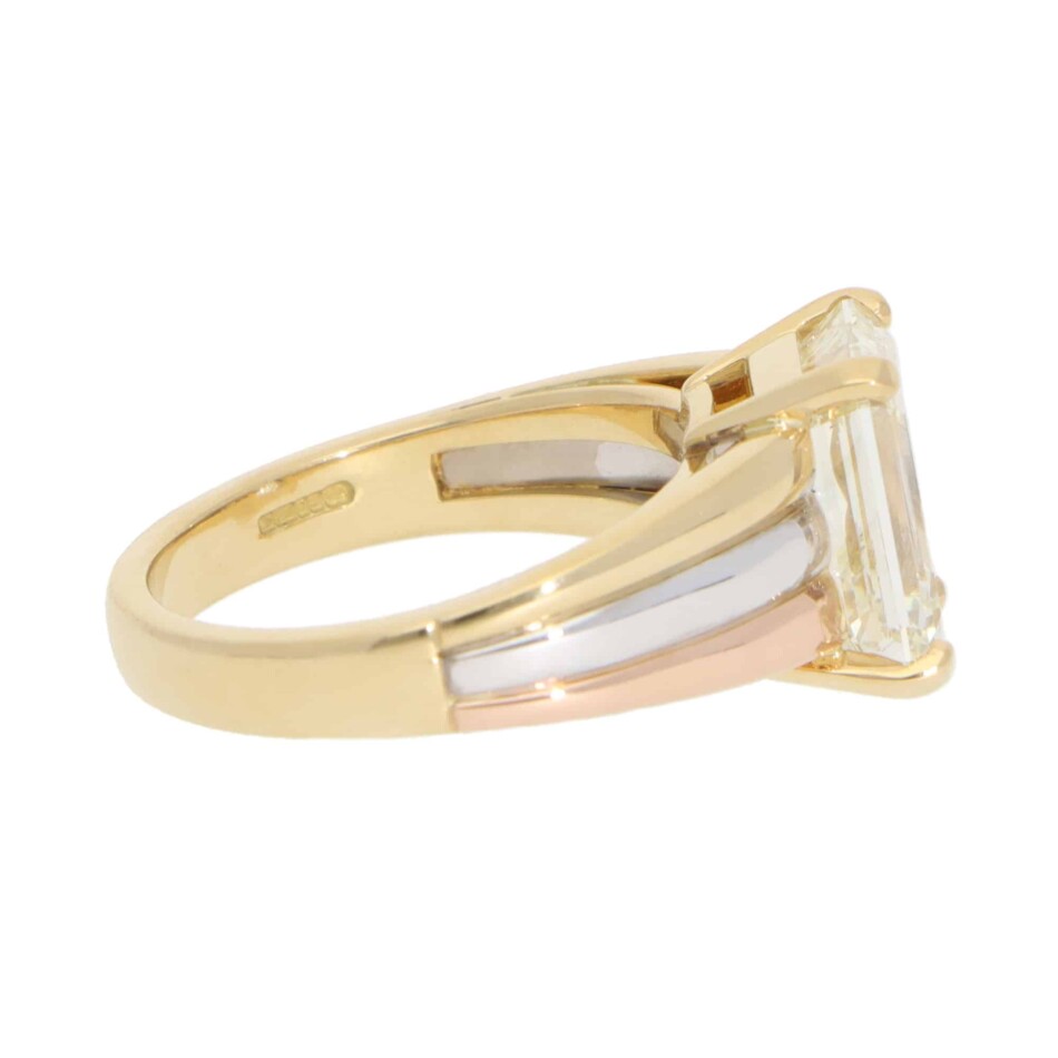 Contemporary 4.51ct Emerald Cut Diamond Ring in Gold