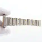 Cartier Santos steel and gold wrist watch with quartz movement.