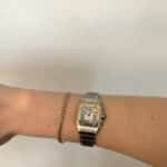 Cartier Santos steel and gold wrist watch with quartz movement.