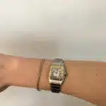 Cartier Santos steel and gold wrist watch with quartz movement.