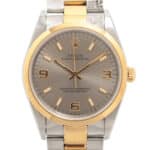 Vintage 1997 automatic Rolex Oyster Perpetual watch with gold