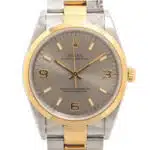 Vintage 1997 automatic Rolex Oyster Perpetual watch with gold