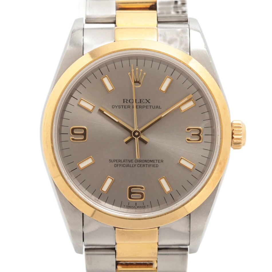 Vintage 1997 automatic Rolex Oyster Perpetual watch with gold