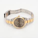 Vintage 1997 automatic Rolex Oyster Perpetual watch with gold