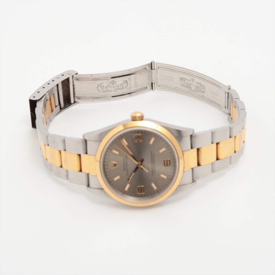 Vintage 1997 automatic Rolex Oyster Perpetual watch with gold