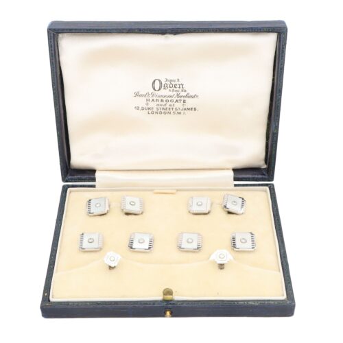 A set of Mother-of-Pearl and Diamond Cufflinks and Dress Studs