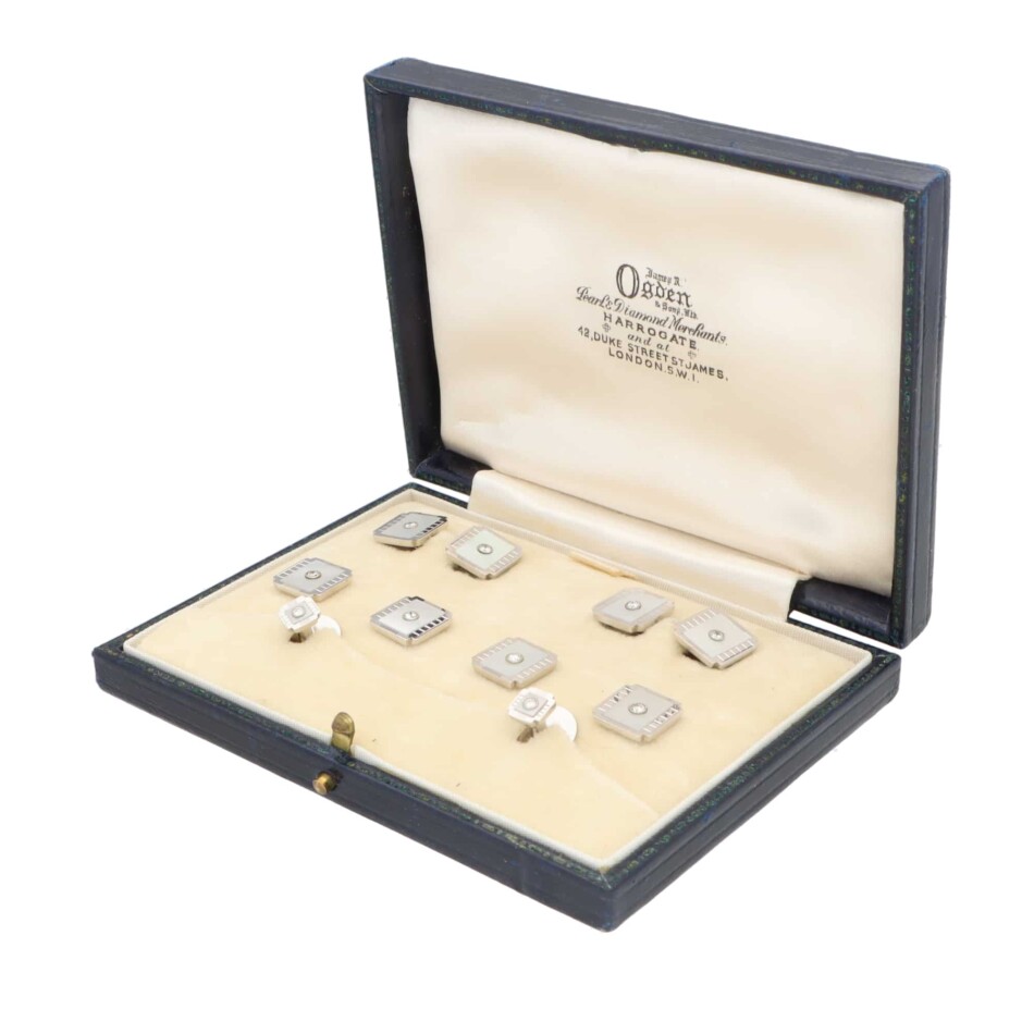 A set of Mother-of-Pearl and Diamond Cufflinks and Dress Studs