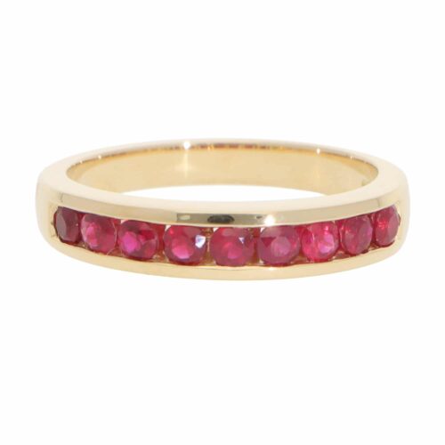 Contemporary Half Eternity Ruby Channel Ring in Yellow Gold