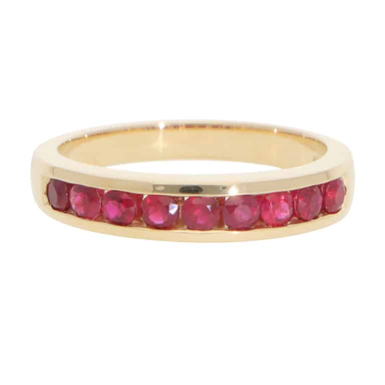 Contemporary Half Eternity Ruby Channel Ring in Yellow Gold